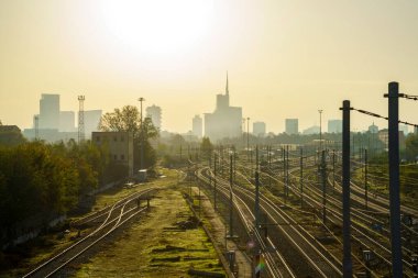 Milan, Lombardy, Italy: railways and modern building of Porta Nuova from the bridge known as Ponte della Ghisolfa, at morning