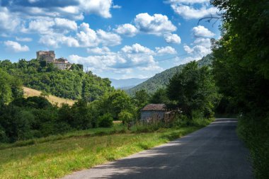 Country landscape in Umbria, Italy, along the via Flaminia from Spoleto to Terni at summer clipart