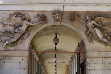 Exterior of historic buildings of Novara, Piedmont, Italy, along via Fratelli Rosselli clipart