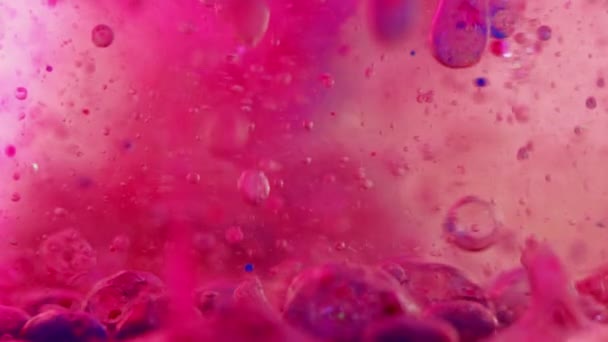 Желейні Бульбашки Падіння Гелевої Рідини Чорнильна Вода Дефокусовані Яскраво Рожевий — стокове відео