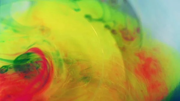 Color mist. Paint water bubble. Defocused bright yellow pink green smoke texture oil ink splash mix floating abstract art background.