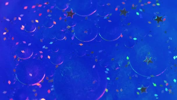 Abstract Background Shimmering Mix Magic Liquid Glowing Sequins Particles Floating — Stock Video