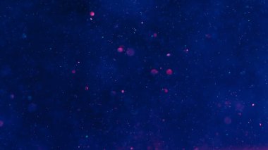 Soyut arkaplan. Baloncuk sıvısı. Su altı etkisi. Mor sıvı ve hava yukarı doğru yüzüyor. Odaklanmış bokeh ışık parıldayan parçacıklar pürüzsüz hareket ediyor..