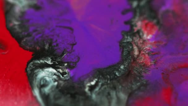 Ink Wave Glitter Paint Water Defocused Neon Purple Red Black — Stock Video