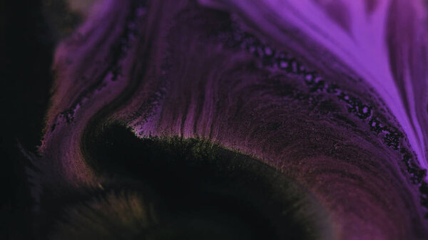 Paint mix. Fluid art. Ink water. Blur purple black color gradient wet glitter acrylic dye spill wave flow opener motion particles texture abstract background.