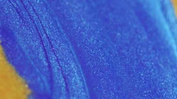 Glitter Fluido Onda Flujo Tinta Color Azul Dorado Brillante Textura — Vídeos de Stock
