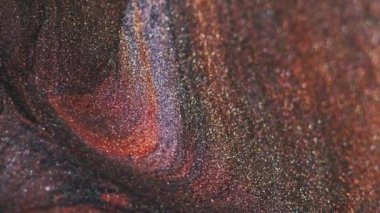 Soyut arkaplan. Parlak mürekkep. Kum karıştırma sanatı. Odaklanamayan parlak, parıldayan altın rengi gri kahverengi boya karışımı parçacıklar pürüzsüz doku akışı.
