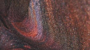 Soyut arkaplan. Parlak mürekkep. Kum karıştırma sanatı. Odaklanamayan parlak, parıldayan altın rengi gri kahverengi boya karışımı parçacıklar pürüzsüz doku akışı.