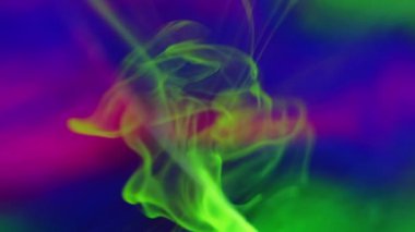 Neon duman dokusu. Mürekkep suyu karışımı. Bulanık yeşil mor mavi renk duvak yüzen hareket soyut sanat arkaplanı.