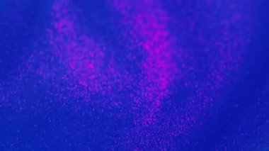 Parçacık arkaplanı. Pırıl pırıl. Soyut galaksi. Bulanık parlak neon mavisi pembe parlak parçacıklar gökyüzü yıldızlarındaki sıvı mürekkep dalgası yaratıcı sanatı etkiler..