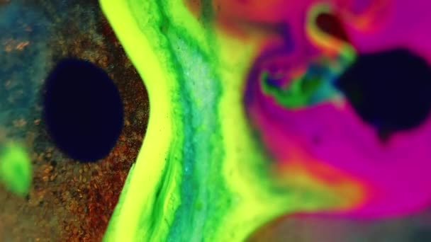 Kleurstof Inktwatermix Defocused Neon Groen Roze Blauw Kleurstof Mix Zwevend — Stockvideo