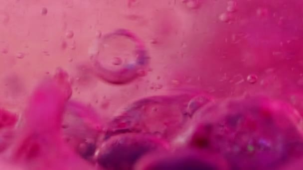 Textura Gota Geleia Bolhas Gel Água Com Tinta Desfocado Rosa — Vídeo de Stock