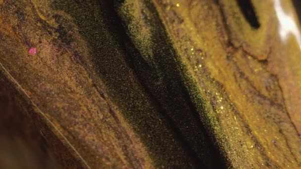 Gotejamento Tinta Glitter Pintar Misturar Água Desfocado Preto Dourado Amarelo — Vídeo de Stock