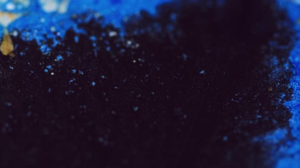グリッター粒子 水の流れを塗る ダストテクスチャインク波動抽象的なアート背景を輝かせる分割されたブルーブラックゴールドカラー — ストック動画