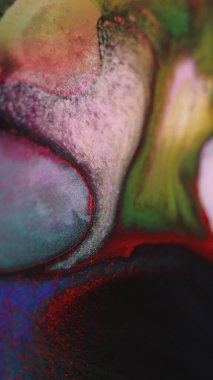 Parıltılı boya döküldü. Yağ balonu. Mürekkep karışımı. Odaklanmamış kırmızı mavi beyaz renk parıldayan doku sıvı damlası dalga hareketi soyut arkaplan.