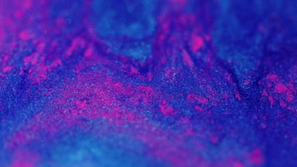 Płyn Brokatowy Rozprysk Farby Defocus Jasny Niebieski Różowy Kolor Połyskujący — Wideo stockowe