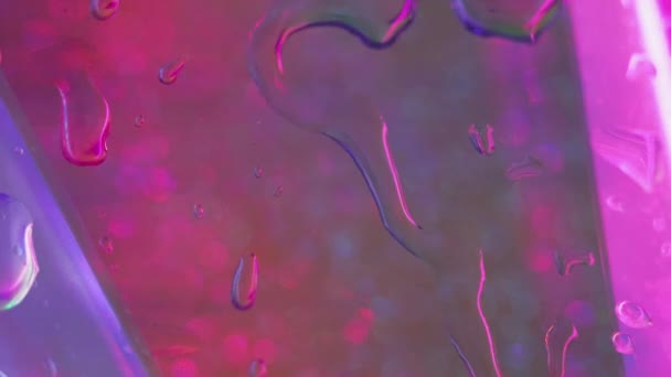 Gota Chuva Colorida Gotejamento Água Janela Molhada Borrão Neon Rosa — Vídeo de Stock