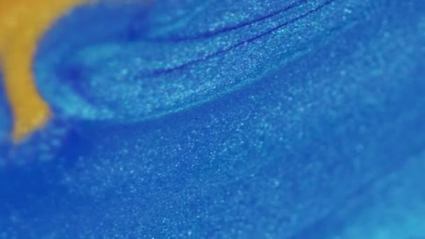 Glitter Fluido Onda Flujo Tinta Color Azul Dorado Brillante Textura — Vídeos de Stock