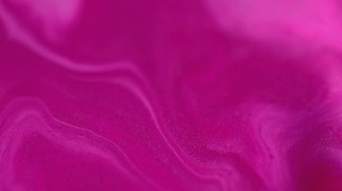 Mürekkep arkaplanı. Akrilik karışımı. Sıvı girdapları. Odaklanmamış neon parıltısı mor renk sıvı boya dalgaları yaratıcı soyut sanat dokusu.