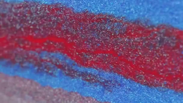 Χύσιμο Μπογιάς Υγρό Φόντο Αστραφτερό Υγρό Κόκκινο Μπλε Χρώμα Λαμπερό — Αρχείο Βίντεο