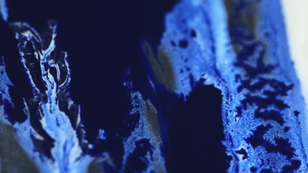 Ink Spill Glitter Paint Flow Defocused Blue Color Shimmering Particles — Stock Video