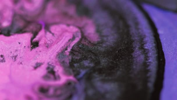 ペイントドロップ グリッターインクスプラッシュ 分割されたピンクの紫色の黒色の光沢のある質の光沢のスプラッターの混合物の動き抽象的な芸術の背景 — ストック動画