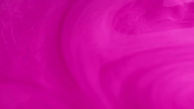 Pembe sis. Parıldayan sıvı. Odaklanmamış parlak pembe renkler parıldayan parçacıklar desen boya su girdabı soyut sanat arka planı.