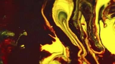 Islak boya arka planı. Pigment sıvısı. Renkli girdaplar. Koyu kırmızı, parlak, ışıldayan parçacıklar boya büyüleyici soyut dalgalar yayıyor..