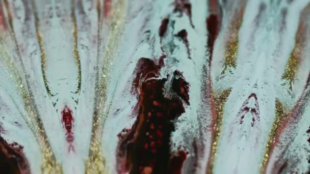 Glitterblekkdrypp Malingssøl Defokusert Blå Gylden Rød Farge Skimrende Partikler Tekstur – stockvideo