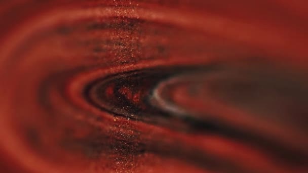 グリッターフライド インク水の流れ 大理石の質のアクリル ペンキのこぼれのカスケードの抽象的な芸術の背景を薄暗くする赤い黒い黄金色 — ストック動画