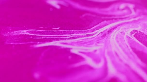 グリッターインクスプラッシュ ペイントブレンド シャイミング フロー 分割された輝くネオン ピンクの白い穀物粒子の質の液体波は芸術の抽象的な背景を広げます — ストック動画