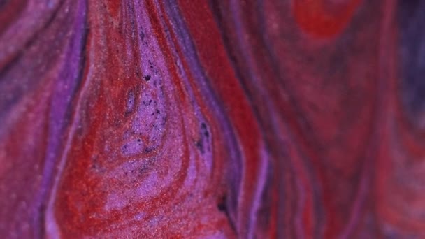 バーティカルビデオ 抽象的な背景 グリッターインク サンドミックスアート 赤い黒い紫色の色の液体のペンキのブレンドの粒子の滑らかな質の流れを薄くする分割された光沢がある — ストック動画