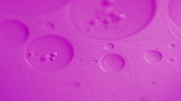 Bubbles Liquid Oil Surface Paint Flow Defocused Bright Pink Color — Stock Video