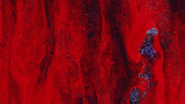 闪烁的油墨背景 油漆混合 闪闪发光的溢出物 催眠抽象艺术中闪烁着的红色黑色颗粒质感液滴波在金属表面的扩散 — 图库视频影像