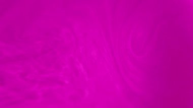 Pembe boya akışı. Mürekkep girdabı. Renk sisi. Odaklanamayan parlak neon sıvısı sızıntısı dalgalar akış büyüleyici sanat soyut arka plan.