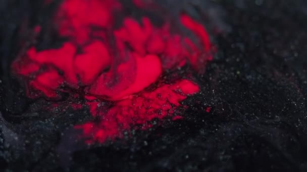 Fluido Purpurina Salpicadura Pintura Lava Volcánica Caliente Blur Rojo Negro — Vídeos de Stock