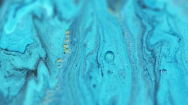 Renk sıvısı parıltısı. Boya akışı. Bulanık neon mavi sim damlası sıvı serum karışım kabarcık parçacıkları su mürekkebi hareketi sanat soyut arkaplan.