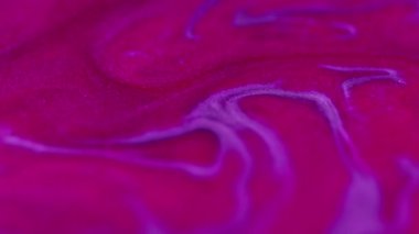 Parlak pigment arkaplanı. Boya sıvısı. Renk sıvısı karışımı. Bulanık parlak doku pembe boya hipnotik akış moda soyut sanatlarda yayılıyor..