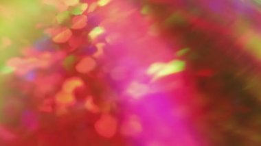 Bokeh ışığı. Renk bulanık halkalar. Disko aydınlatması. Odaklanmamış parlak neon pembe mavi pullu ışınlar hareket sanatının soyut arkaplanı.