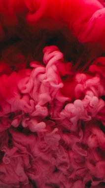 Boya suyu sıçraması. Buhar bulutu. Odaklanmamış pembe renk parıldayan parçacıklar patlama dumanı soyut sanat arkaplanı.