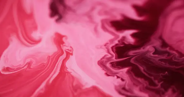 Stock image Pink spill. Acrylic wave. Defocused bright red color gradient glowing marble texture paint emulsion blend abstract art background.