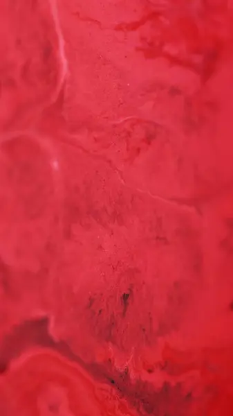 Stock image Ink spill. Paint water flow. Defocused red pink white color pigment dust particles acrylic dye fluid emulsion liquid mix abstract art background.