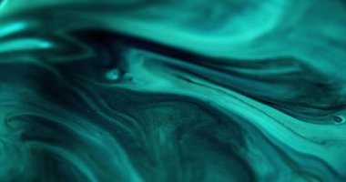 Boya dalgası. Renk karışımı. Odaklanamayan cyan mavisi parlak parçacıklar akrilik akışkan akış hareketi soyut sanat arka planı.