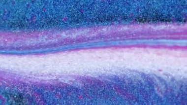 Bulanık parıltı dokusu. Bokeh ışığı. Odaklanmamış mavi mor renkli parlak yuvarlak parçacıklar boya karışımı soyut sanat arkaplanı.