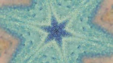 Kış mandala 'sı. Sihirli boya deseni. Odaklanmamış neon rengi parlayan sıvı sıçrama ışıl ışıl kar tanesi simetrik süsleme soyut sanat arkaplanı.