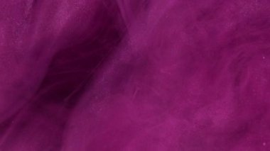 Parıldayan bulut. Boya suyu akışı. Odaklanmamış pembe renkler ışıldayan parçacıklar dokusu duman dalgası hareketli soyut sanat arkaplanı.