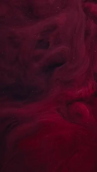 Stock image Shimmering fume. Paint water. Defocused pink red black color sparkling dust texture haze flow on dark abstract art background.