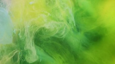 Renk bulanıklığı. Boya suyu akışı. Parlak neon yeşil mavi sıvı girdap akrilik buhar bulutu hareket sim toz soyut sanat arka planı.