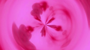 Kaleydoskop boya. Soyut süs. Odaklanmamış morumsu pembe mürekkep rengi su damlası karışık çember akışı hipnotik hareket meditasyon sanat arka planı.