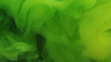 Toz bulutu. Su dalgalarını boya. Bulanık yeşil renk parıldayan parçacıklar patlama sihirli buhar yüzen soyut sanat arka planı.